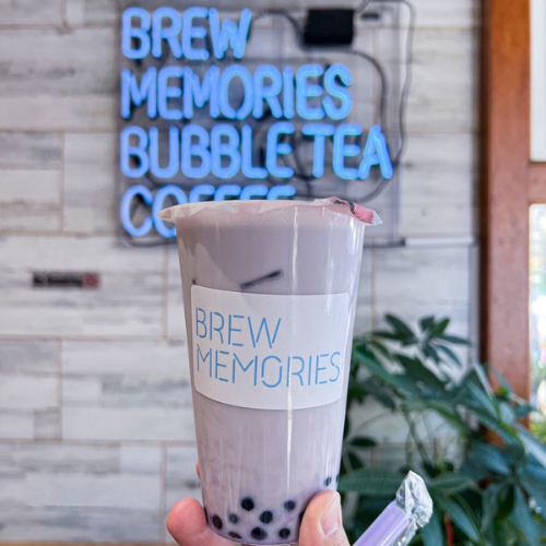 Entrance of Brew Memories, a quaint coffee and bubble tea shop in Park Slope, Brooklyn, showcasing a welcoming storefront and a vibrant neighborhood vibe.